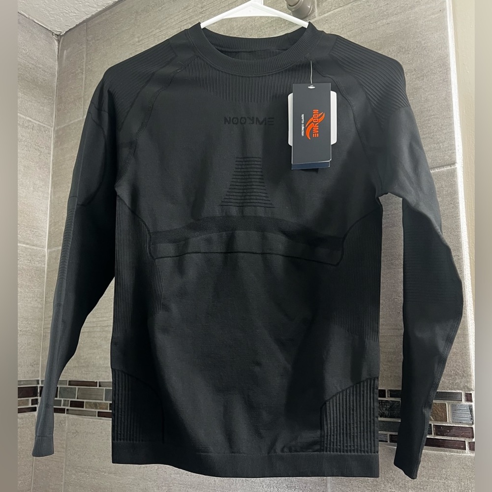 Nooyme women’s large thermal long-sleeve shirt. New with tags!